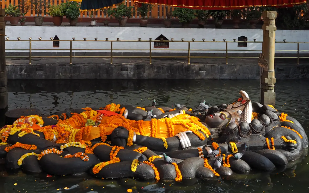 Budhanilkantha (Lord Vishnu) Statue resting in the coils of the serpent Shesha