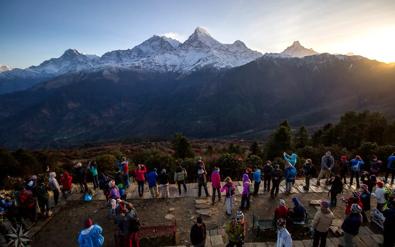 Crowd Enjoying Breathtaking Sunrise Views from Ghorepani Poon Hill